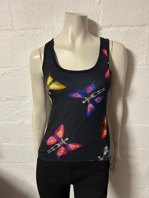 Linne fr Insanity storlek S/M - Helt nytt linne med boxerrygg i storlek S/M. Från Poizen. 