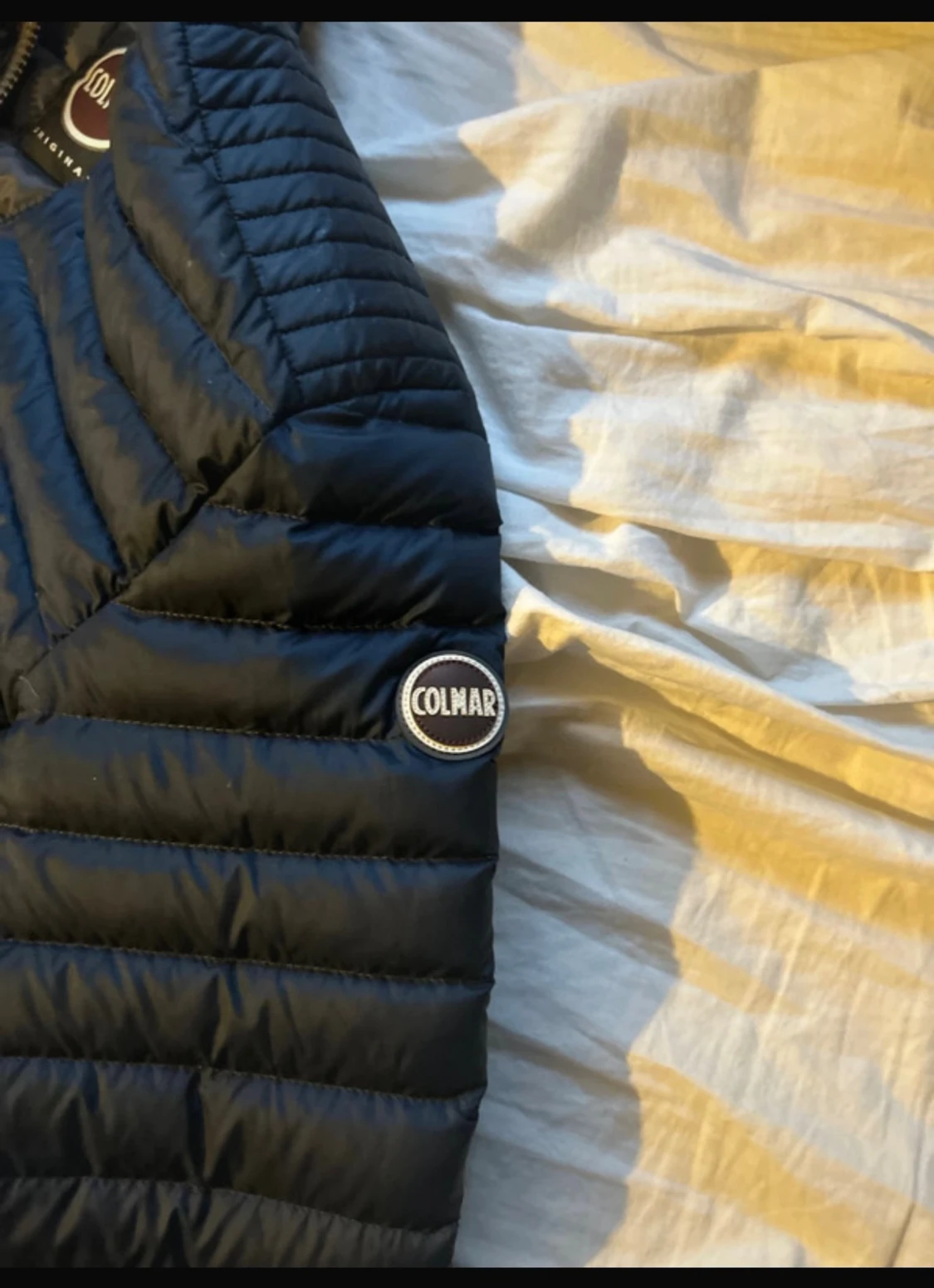 Mörkblå pufferjacka från Colmar - 1