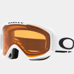 Oakley vita skidglasögon med orange lins - Säljer ett par feta Oakley skidglasögon med vit ram och bredt vitt band med svart Oakley-logga. Linsen är orange och ger grym kontrast i snön. Perfekta för dig som vill sticka ut i backen och få maxad sikt under åkning.