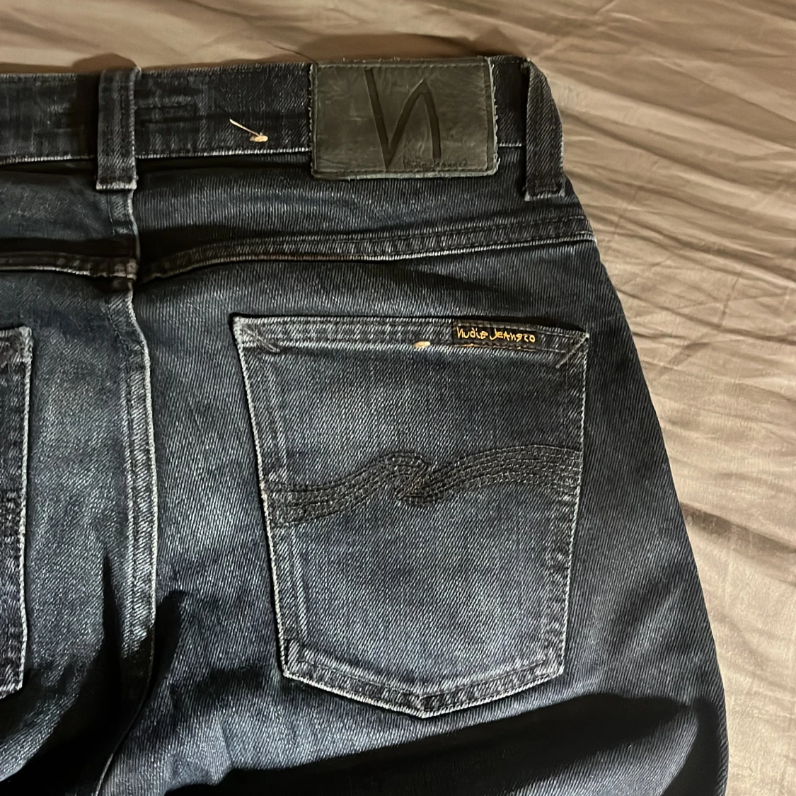 Svarta Grim trim jeans från Nudie Jeans - 1