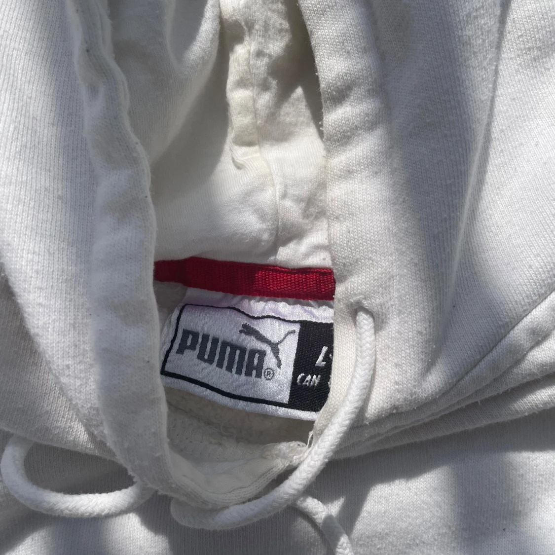 Vit ärmlös hoodie från Puma - 4