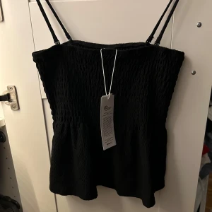 Smockat linne svart - Helt ny! Går ej att köpa längre