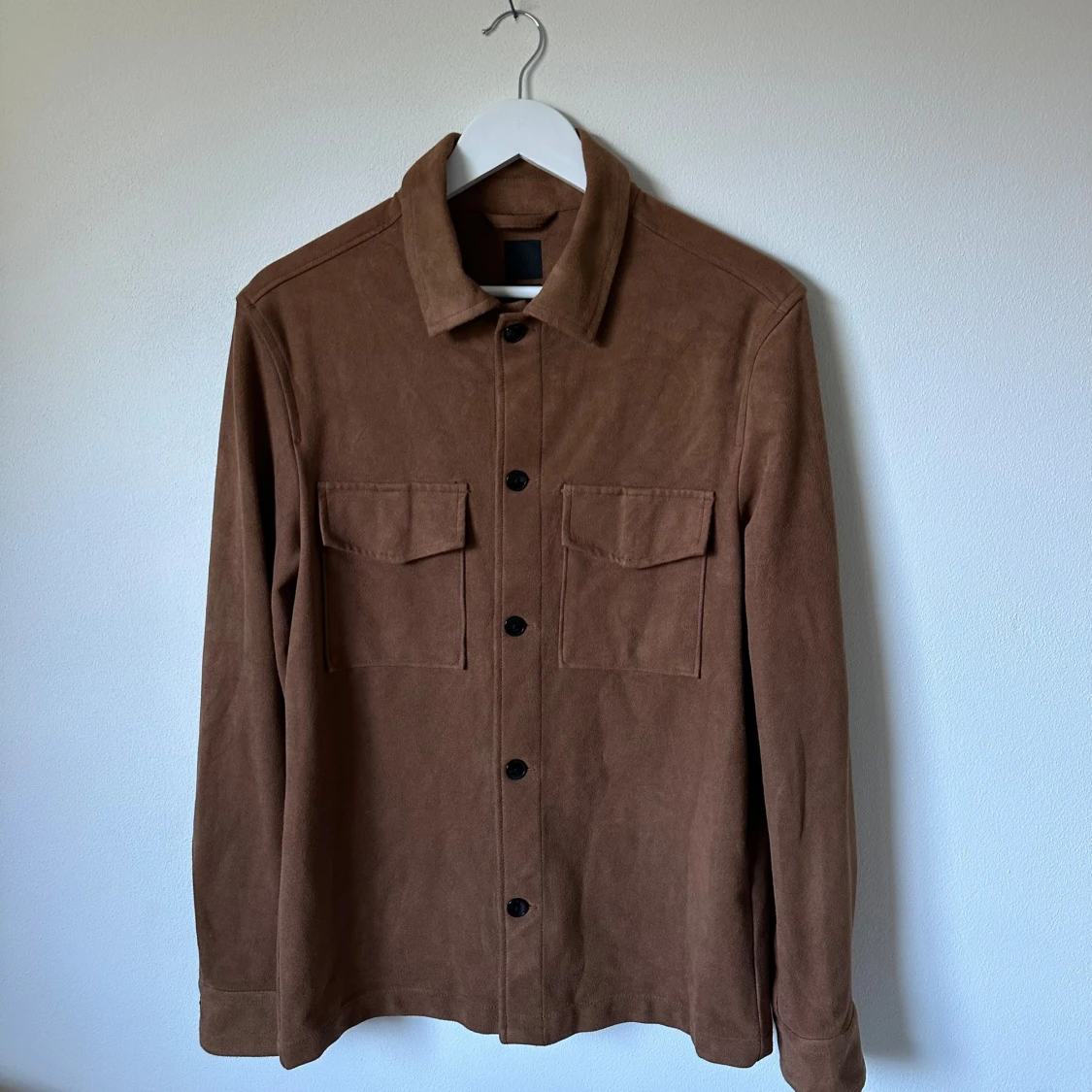 Brun H&M jacka i mockaimitation