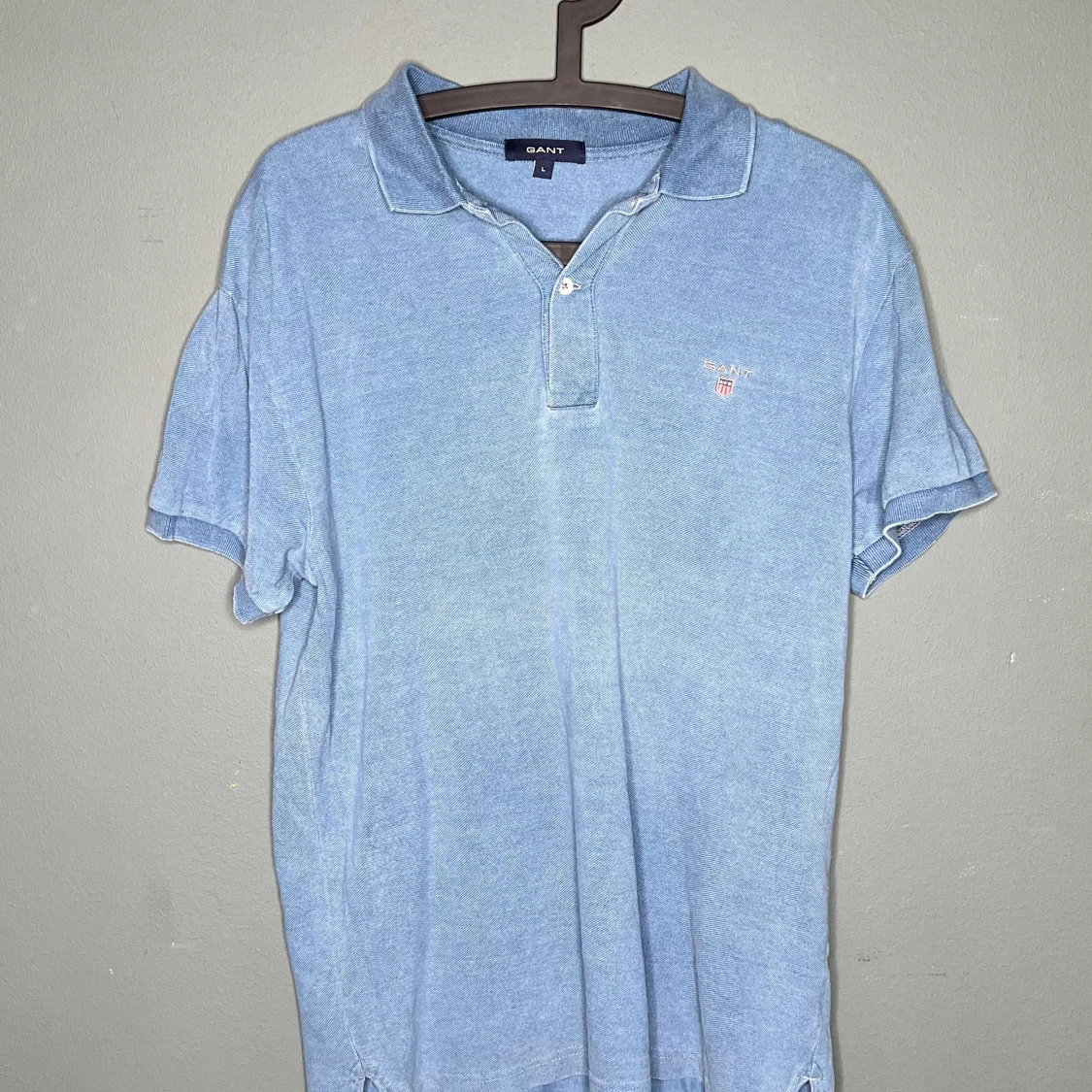 Blå pikétröja från GANT i bomull