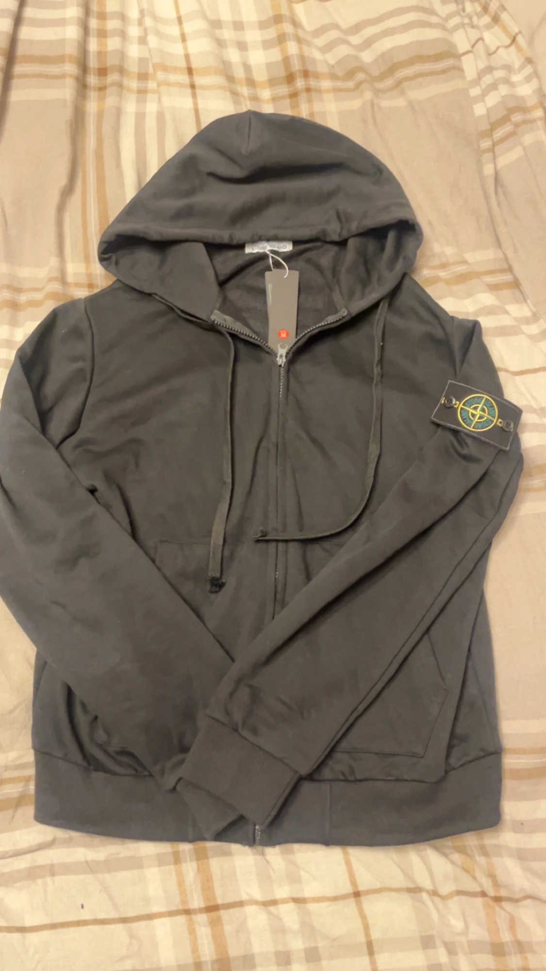 Svart hoodie från Stone Island