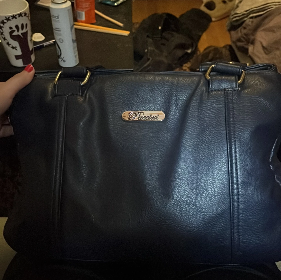 Mörkblå axelväska från Puccini