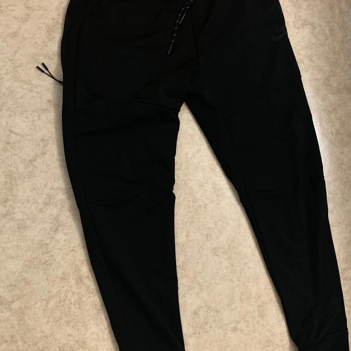 svart nike tech för sport