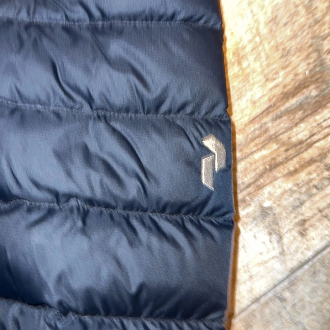 Mörkblå dunjacka Peak Performance - 92