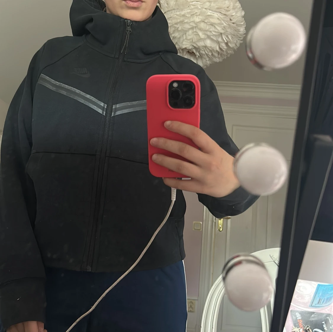 Svart Nike Tech kofta med reflexdetaljer