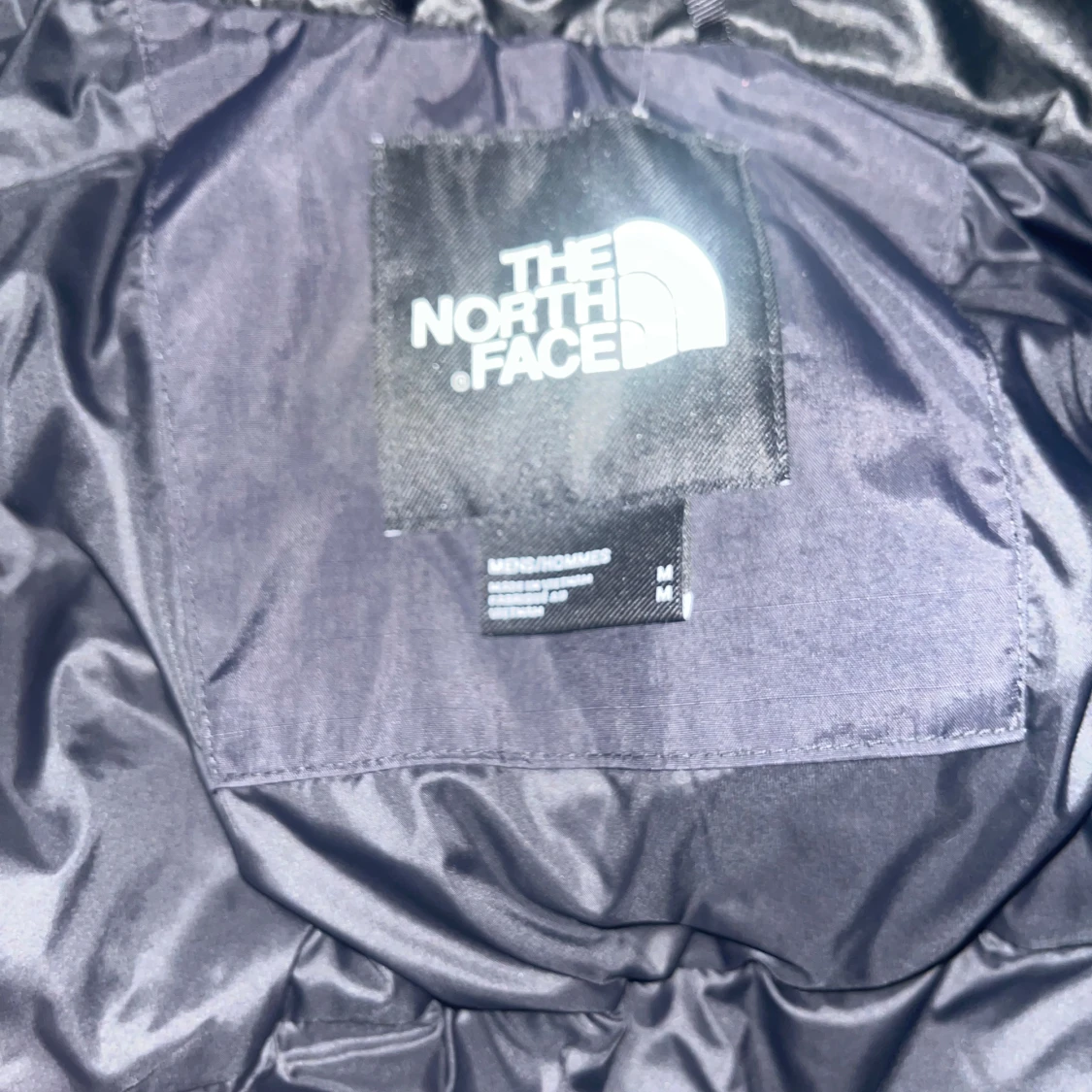 Svart dunjacka från The North Face - 4