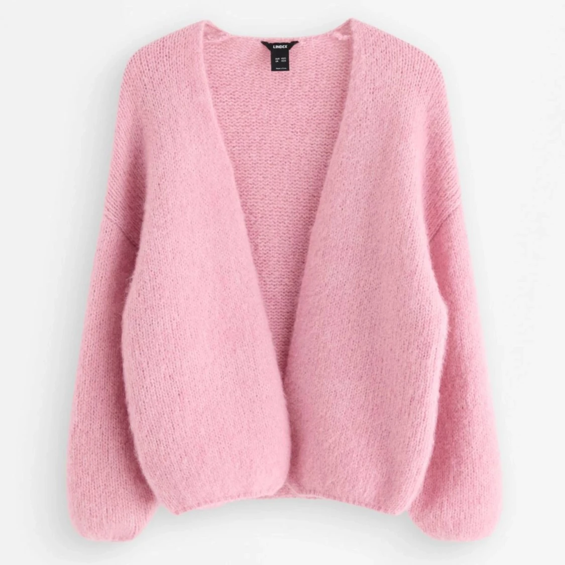 Rosa stickad kofta från Lindex