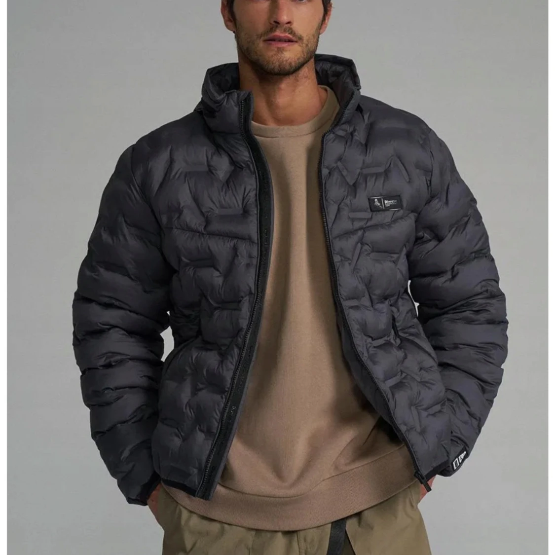 Mörkgrå pufferjacka från Dakar