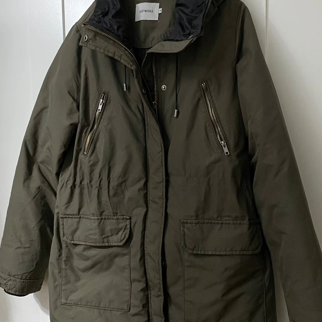 Olivgrön parkas från Size & Needle