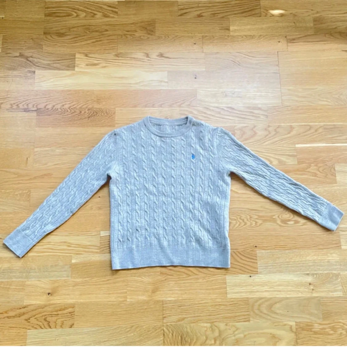 Beige kabelstickad tröja från Morris