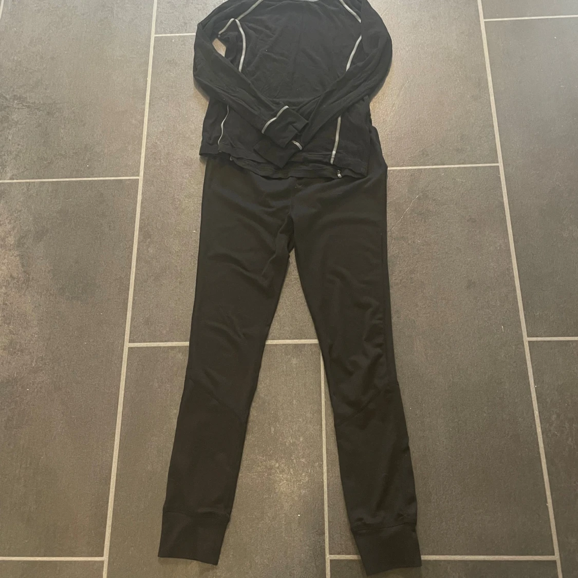 Svart underställ  134/140