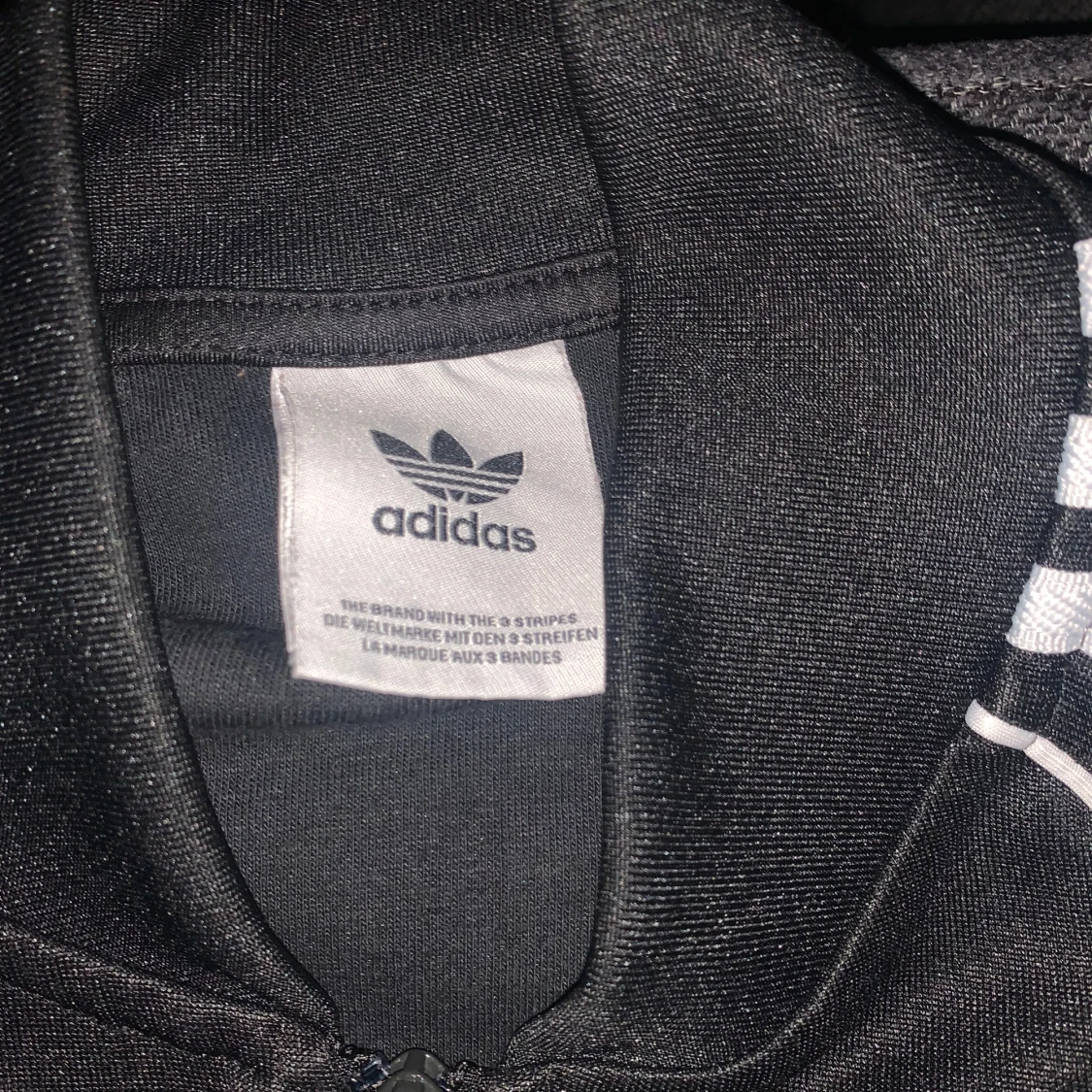 Svart Adidas track jacket med vita ränder - 1