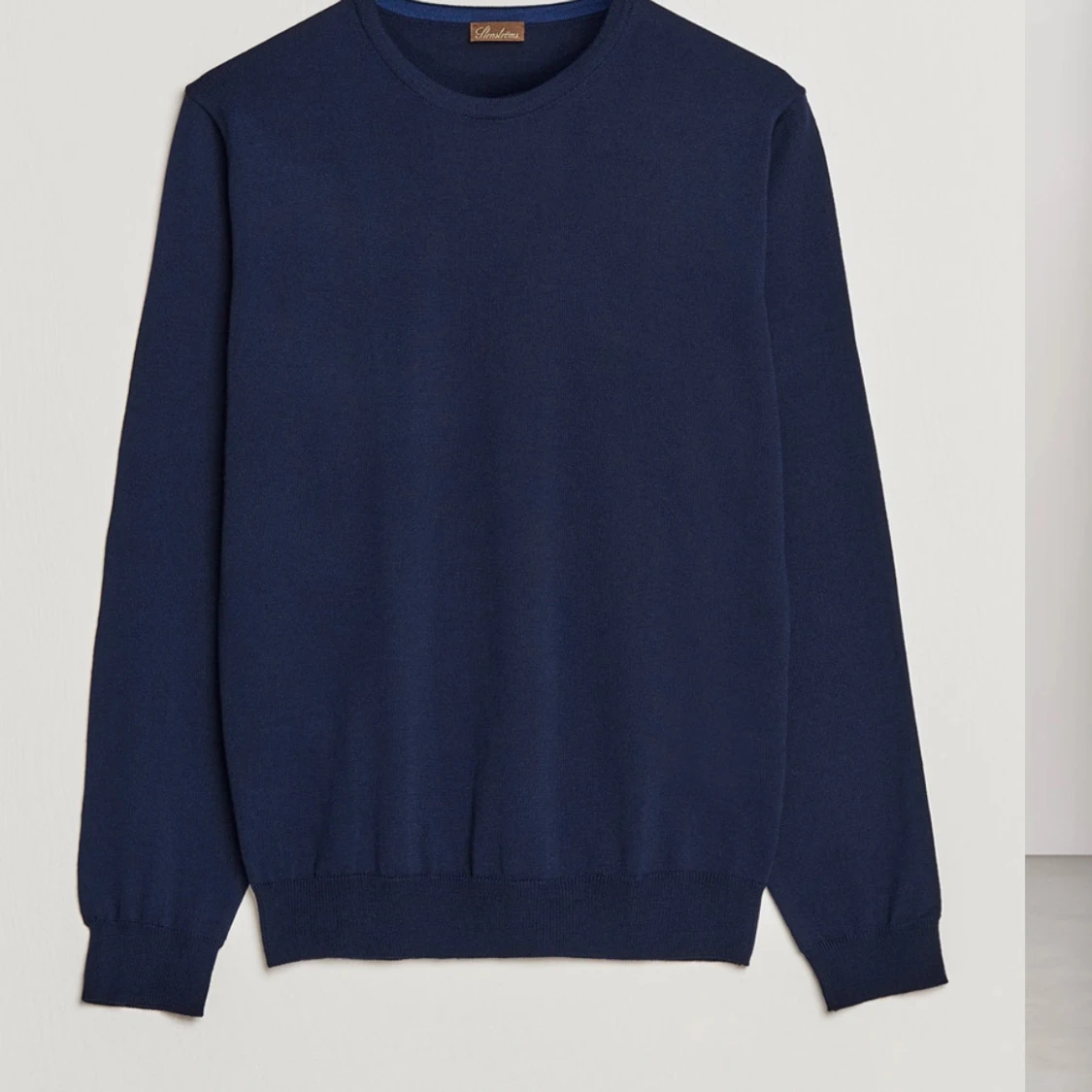 Marinblå stickad tröja från Stenströms