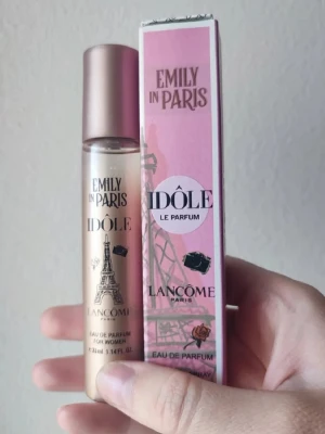 Lancome Idole Emily In Paris - Lancome Idole Emily In Paris Perfume. 33ml bottle. New! Discontinued scent. Great all year around fragrance.