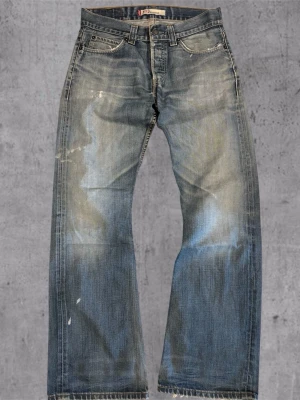 Blå bootcut jeans Levis - Levis 512 bootcut jeans, mått finns på bild, snygga slitningar förekommer