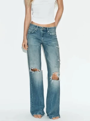 Zara jeans  - Lågmidjade jeans med slitningar från Zara! 