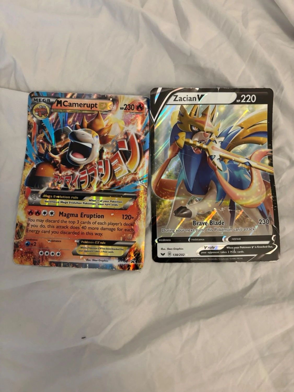 Pokémonkort Mega Camerupt & Zacian V