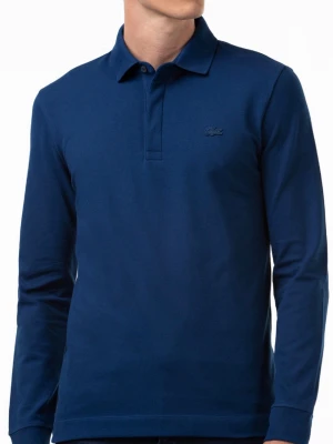  Lacoste tröja - Snygg sällsynt mörkblå långärmad Från Lacoste med klassisk krage och knäppning framtill. Tillverkad i mjukt bomullsmaterial och har en diskret logga på bröstet. Perfekt för en clean och stilren look. Helt ny aldrig använd och priset kan diskuteras vid snabb affär