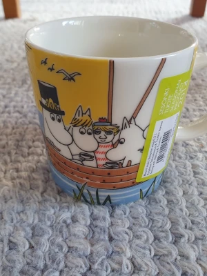 Muminmugg Segla med Klippdassar Mumin  - Felfri mugg med etikett kvar. Säljer fler Muminmuggar så kika gärna också mina övriga annonser. Packar mycket noggrant. 