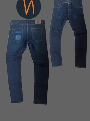 Nudie jeans selvedge lean Dean - Säljer dessa sjukt schyssta nudie dry True selvedge i modellen lean Dean🔥🔥🔥  _________________________________________________ Jeansen har riktigt snygga telefon fades på både fram och baksidan, men kan få ännu mer eftersom de är selvedge. De är i mycket bra skick utan defekter.😄  _________________________________________________   Storlek  W:30 L:32   Tveka inte på att slänga iväg ett prisförslag eller meddelande vid någon fundering