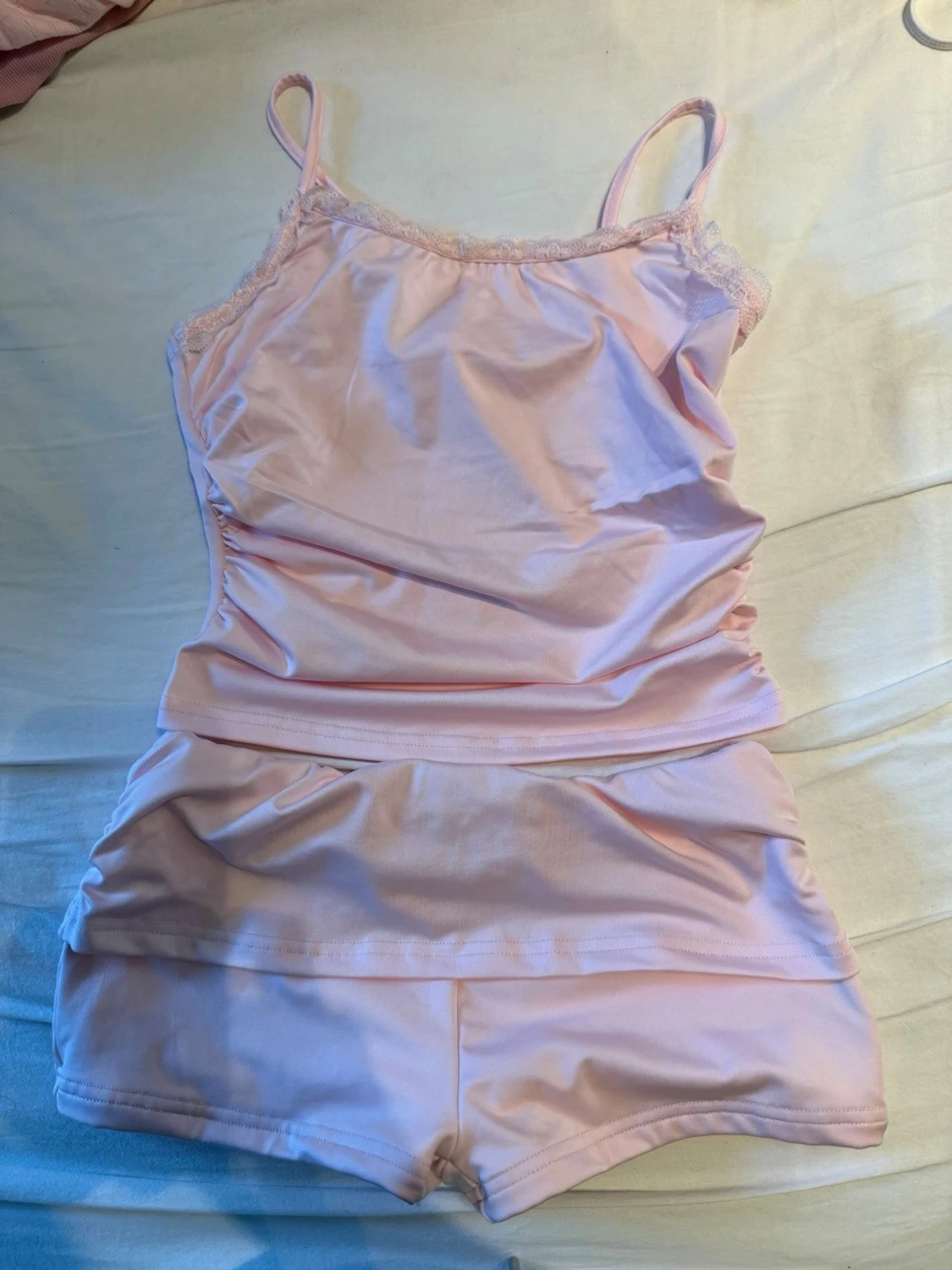 Ljusrosa linne och shorts set