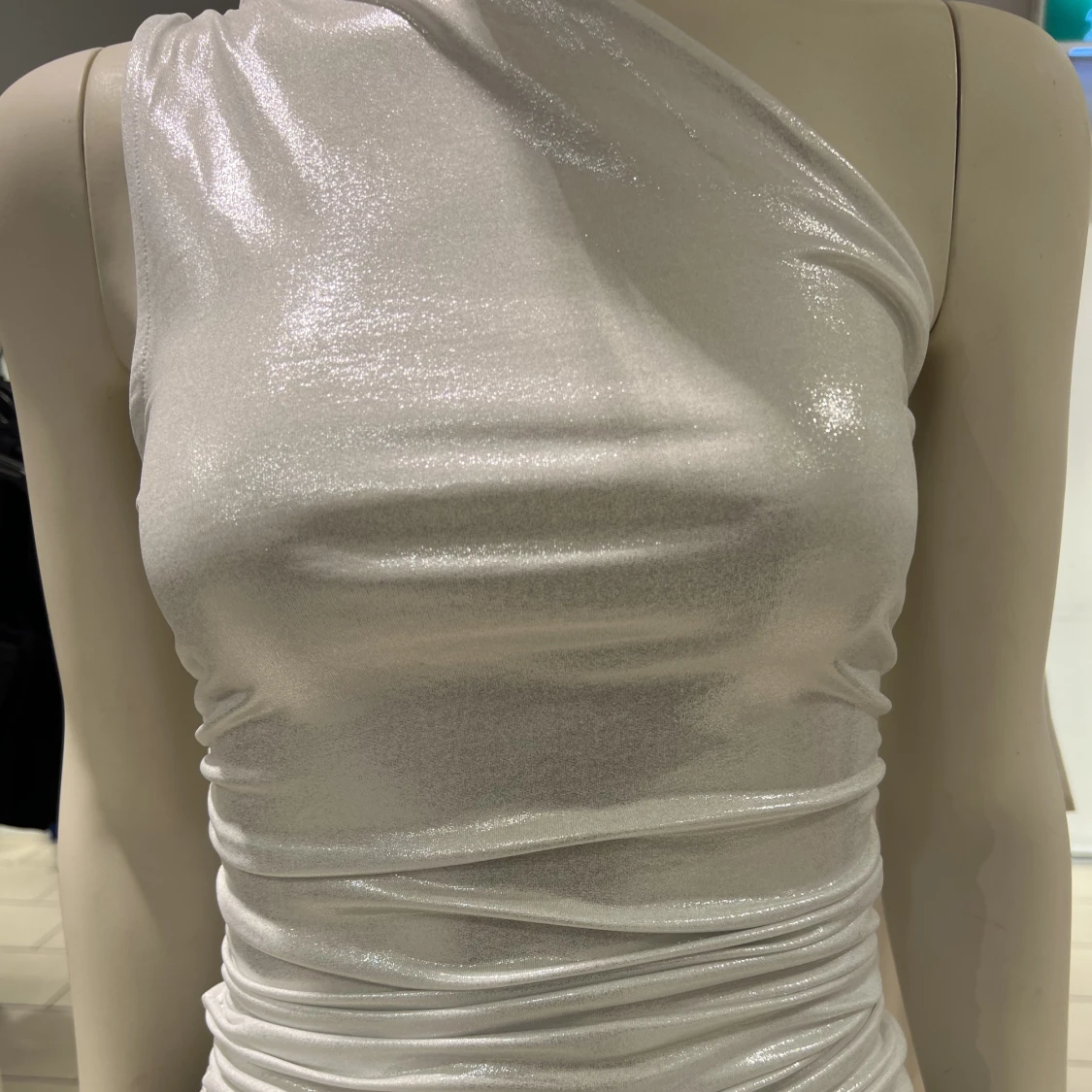 Silvrig topp/linne  - 90