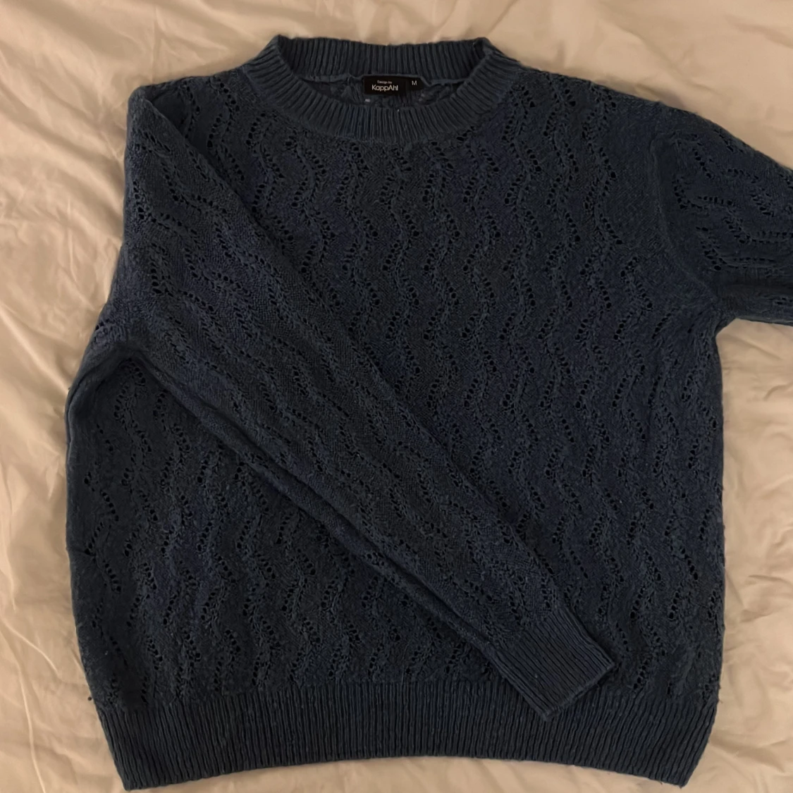 Mörkblå stickad tröja  - 91