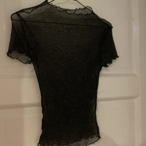 Glittrig mest topp - Inga lappar på, otroligt stretchig. Passar xxs-m