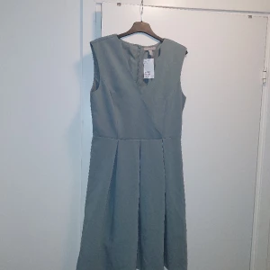 Klänning från hm strl 40 - Klänning från hm. Aldrig använd. 