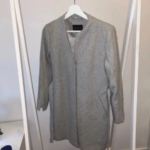 Ullkappa  - Knappt använd. 