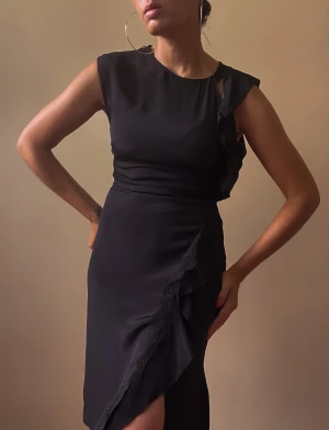 Preloved 3.1 Phillip Lim Silk Black Dress - preloved silk Black dress by 3.1 Phillip Lim  size 0  beautiful lace trim   2 zippers for a fitted look: shoulder & side zip   excellent condition 