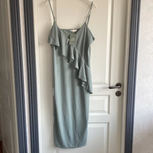 Klänning - HM klänning. Helt ny