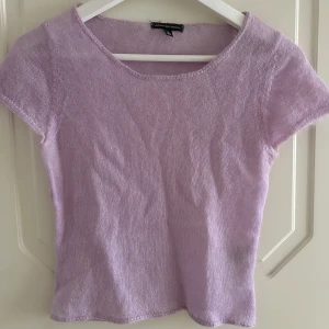 Topp - Stickad topp från. Liten i storlek 