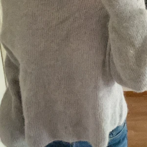 Stickad tröja, bikbok - Säljer denna sjukt snygga ljusblåa stickade tröjan från bikbok då jag tyvärr inte fått användning utav den. Den är i XL men skulle säga att den sitter mer som en M.  