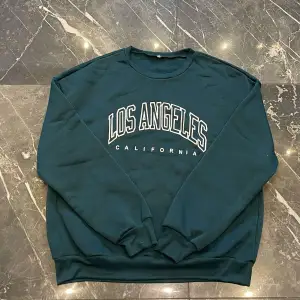 Los Angeles sweatshirt Oanvänd  Storlek: M Material: 100% polyester