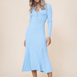 Adoore ljusblå klänning storlek 36