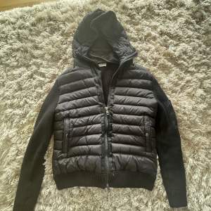 Moncler Cardigan with hood. Used a couple of times. Fits very nice and looks good with anything. 