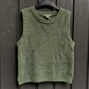 Stickad väst - Grön stickad väst från monki, använd fåtal gånger