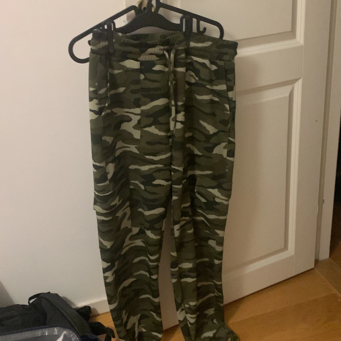 Grön vita byxor i st L