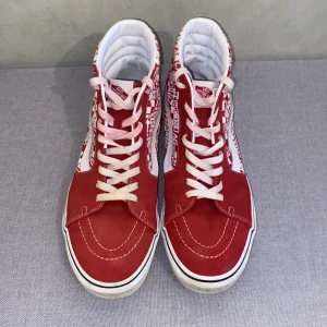 Red customised high-top vans - Bought these a while ago and have only worn them a few times. No creases, rips or any other issues.