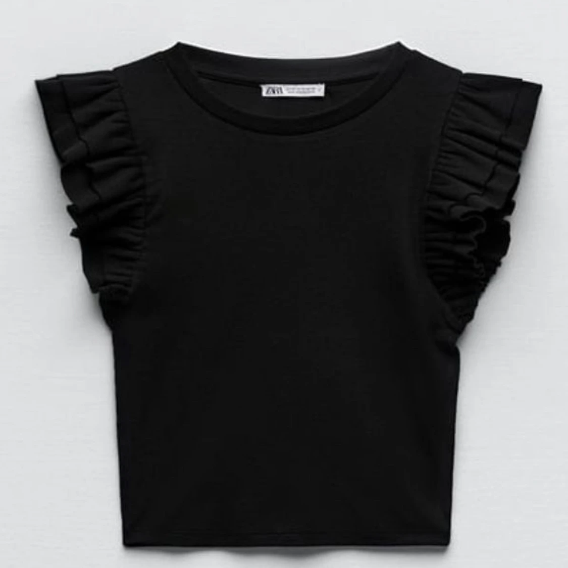 Zara topp med volang