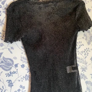 Glittrig topp - Glittrig topp perfekt till alla tillställningar!