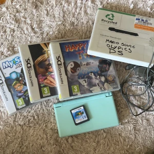 Nintendo DS - Ett Nintendo DS med 5 spel och laddare. Fungerar utmärkt. 