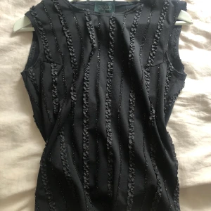 Topp - En jättefin topp i storlek 38, använd Max 1 gång 