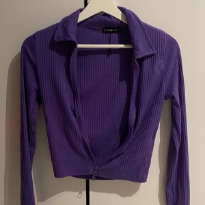 Lila topp  - En lila topp