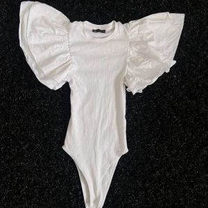 Body  - En fin body till simmare eller till fest, pris kan diskuteras 